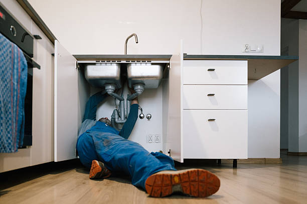 Professional Drain Cleaning technician working in Minot, MA